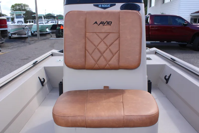 Slide: The Image of 2024 Avid 18 Rogue boat with tan leather seating. - 9