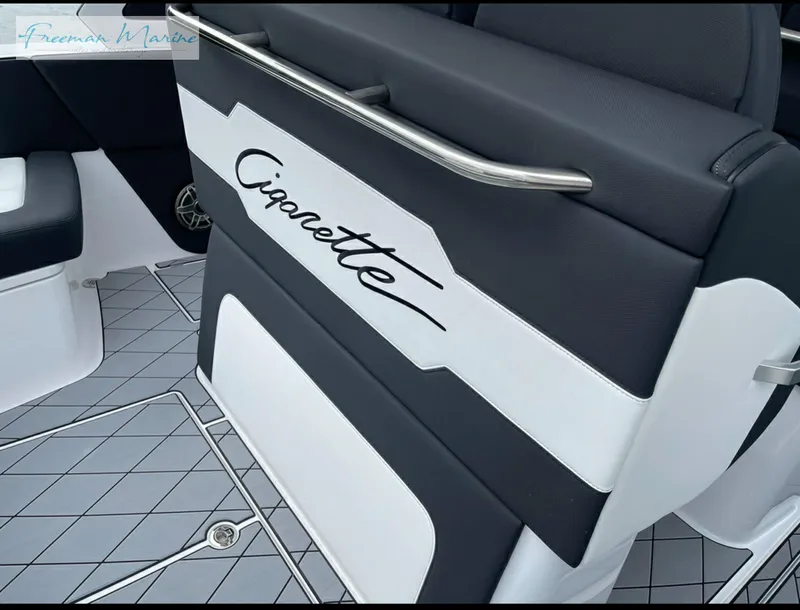 Slide: The Image of 2021 Cigarette 41 Nighthawk boat interior with branded seating and modern design. - 12