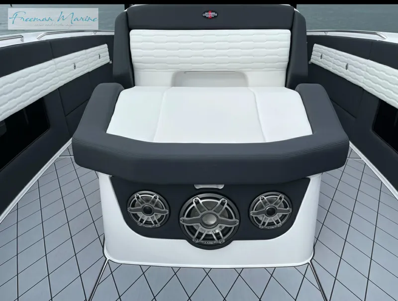 Slide: The Image of 2021 Cigarette 41 Nighthawk boat interior with premium seating and built-in speakers. - 17