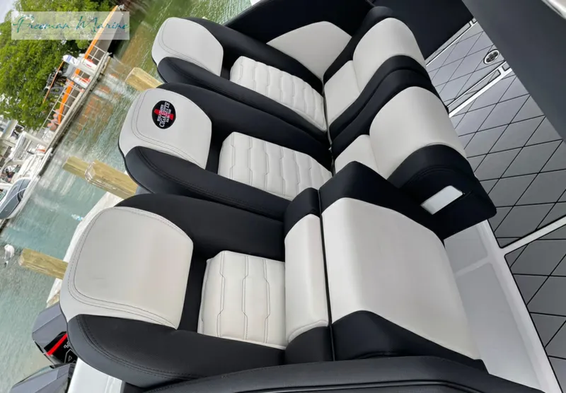 Slide: The Image of 2021 Cigarette 41 Nighthawk boat interior with black and white seating. - 19