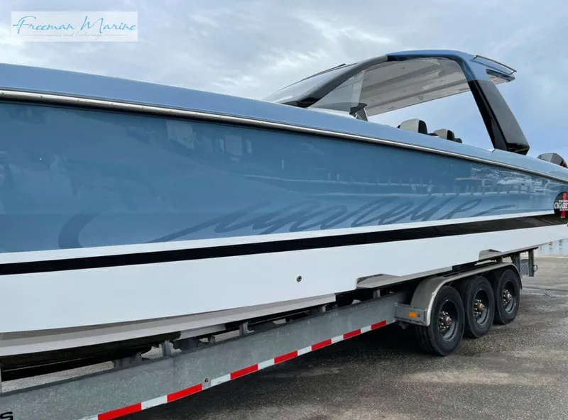 Slide: The Image of 2021 Cigarette 41 Nighthawk boat on a trailer at Freeman Marine. - 6