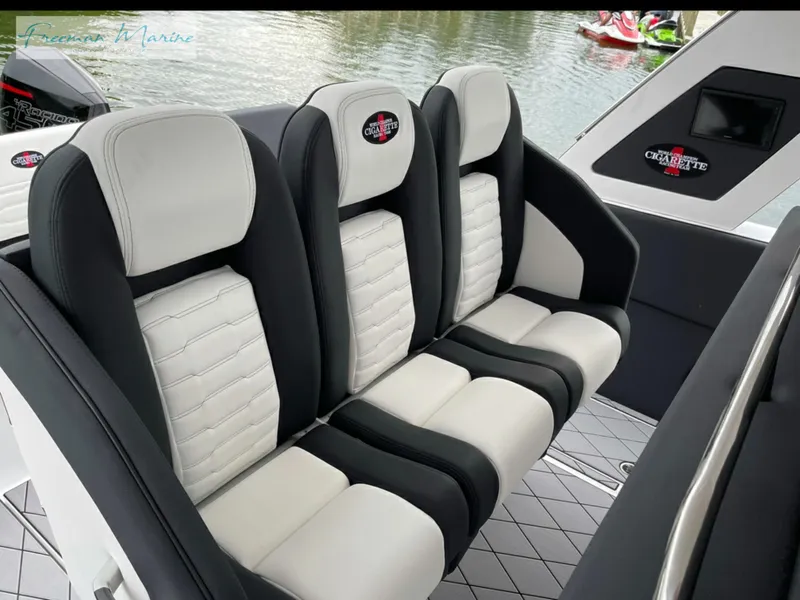 Slide: The Image of 2021 Cigarette 41 Nighthawk boat interior with luxurious seating and modern design. - 7