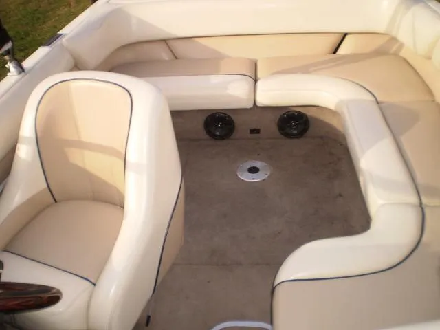 Slide: The Image of 2001 Malibu VLX boat interior with beige seating and carpet. - 10