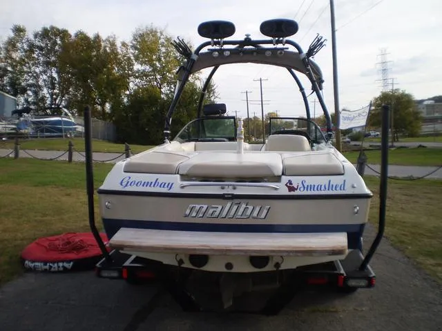 Slide: The Image of 2001 Malibu VLX boat with wakeboard tower and speakers, rear view. - 3