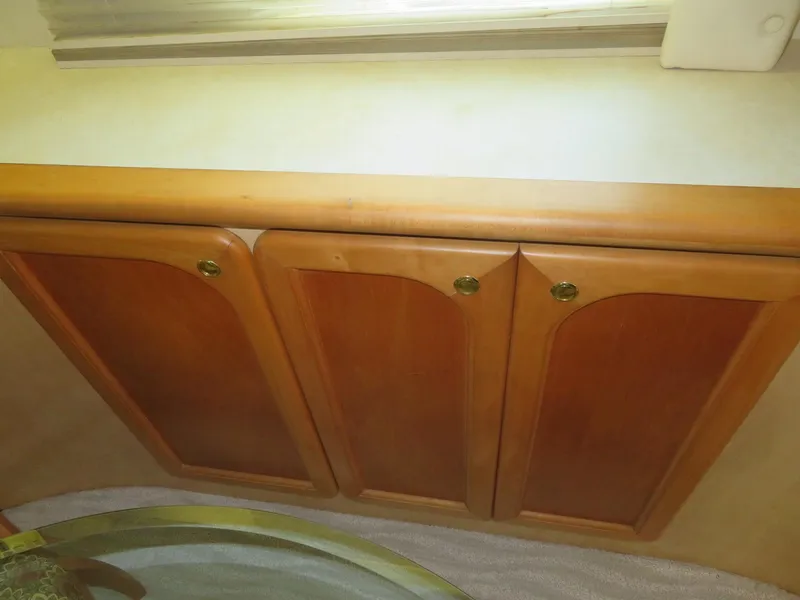 Slide: The Image of Wooden cabinetry in the 2000 Bluewater Yachts 5800 Motor Yacht interior. - 35