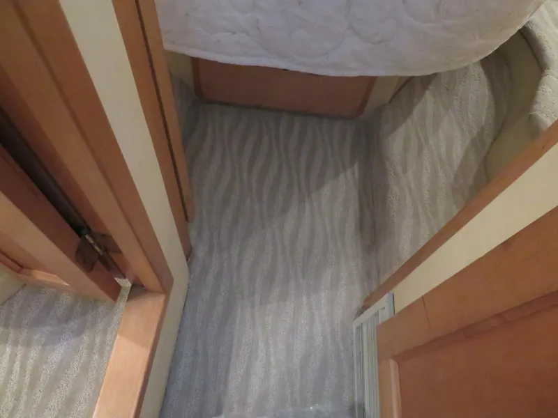 Slide: The Image of Interior hallway of 2000 Bluewater Yachts 5800 Motor Yacht with patterned carpet. - 40