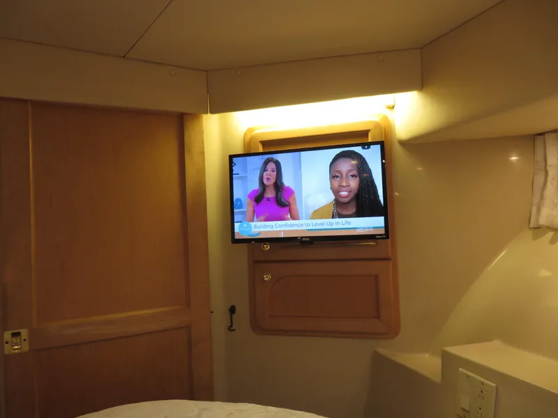 Slide: The Image of TV in the cabin of a 2000 Bluewater Yachts 5800 Motor Yacht. - 45