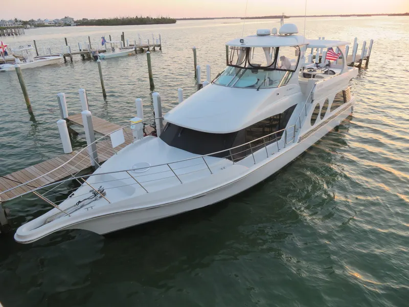 Slide: The Image of 2000 Bluewater Yachts 5800 Motor Yacht docked at sunset. - 9