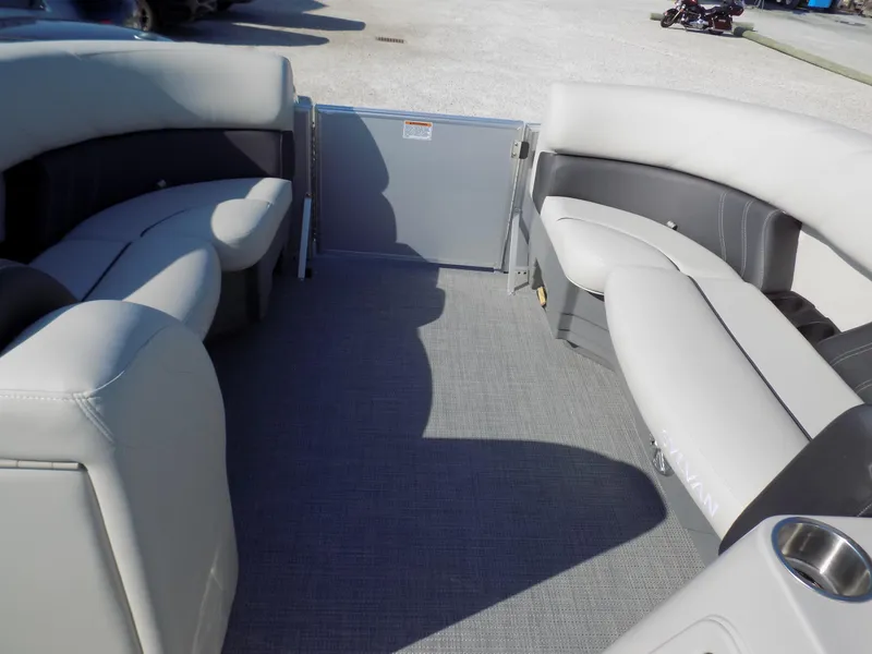 Slide: The Image of 2024 Sylvan Mirage 8522 LZ pontoon boat interior with spacious seating and modern design. - 6