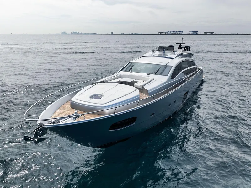 Slide: The Image of 2017 Pershing 82 VHP luxury yacht cruising on open water. - 11