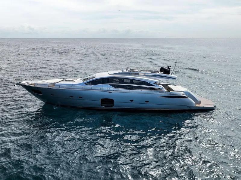 Slide: The Image of 2017 Pershing 82 VHP luxury yacht cruising on open water. - 12