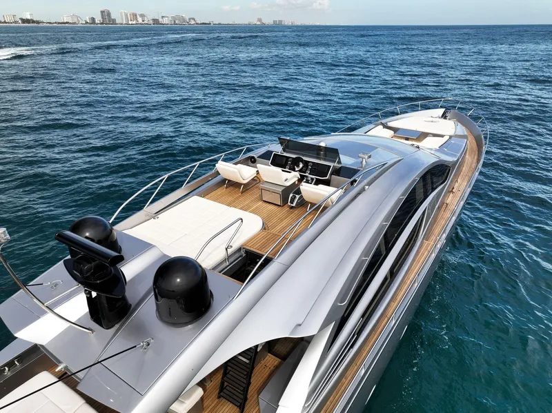 Slide: The Image of 2017 Pershing 82 VHP luxury yacht cruising on the ocean. - 18