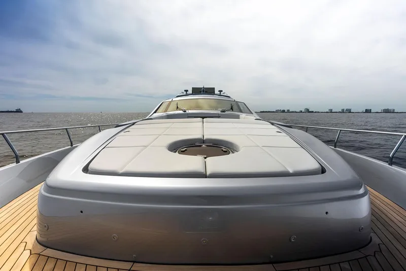 Slide: The Image of 2017 Pershing 82 VHP yacht on open water, front deck view. - 24