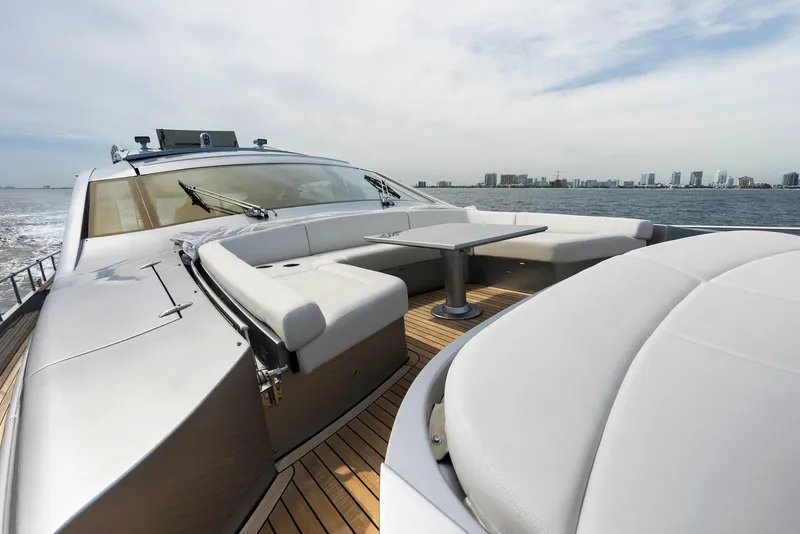 Slide: The Image of Luxurious 2017 Pershing 82 VHP yacht with spacious deck seating and ocean view. - 25