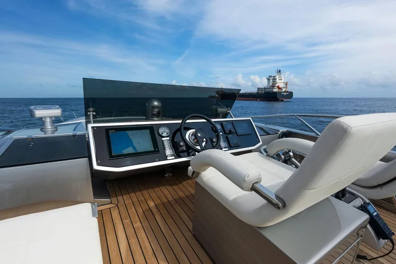 Slide: The Image of 2017 Pershing 82 VHP yacht helm with ocean view. - 28