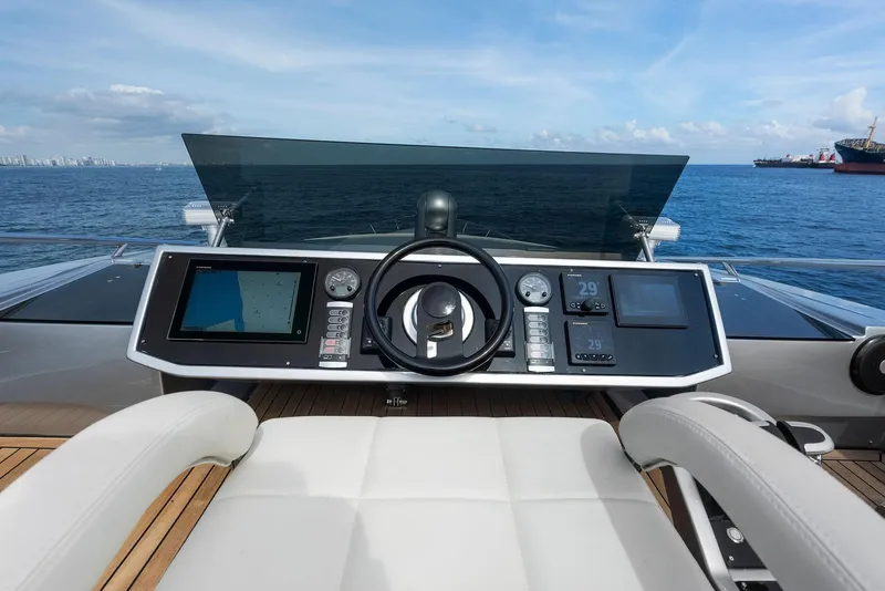 Slide: The Image of Cockpit view of 2017 Pershing 82 VHP yacht with modern navigation controls. - 29