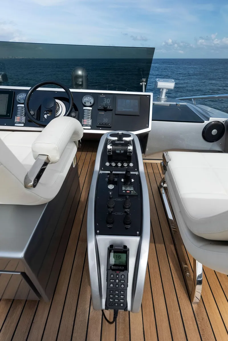 Slide: The Image of Control console of a 2017 Pershing 82 VHP yacht with ocean view. - 30