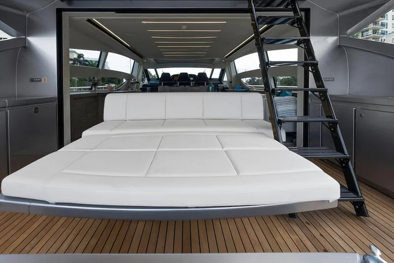 Slide: The Image of 2017 Pershing 82 VHP yacht with spacious white lounge area and modern interior. - 38