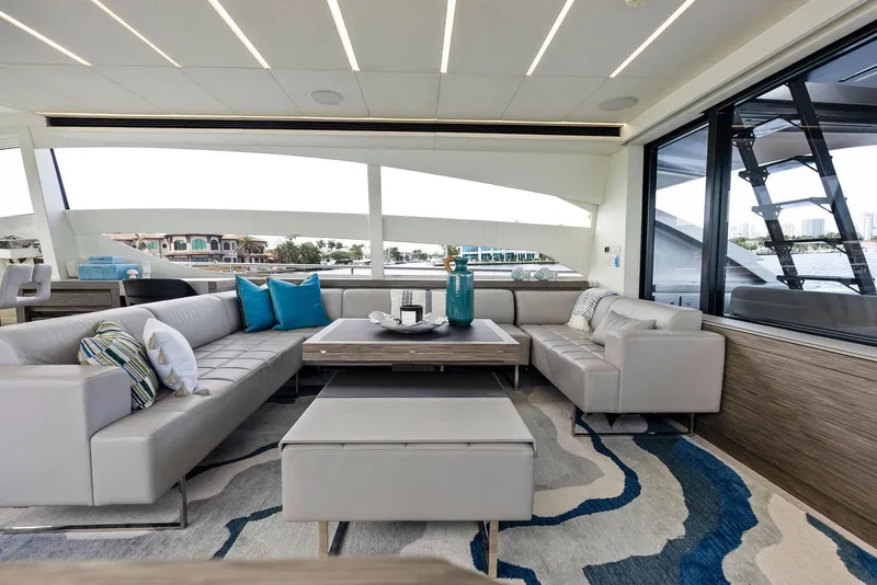 Slide: The Image of Luxurious interior of 2017 Pershing 82 VHP yacht with modern seating and decor. - 48