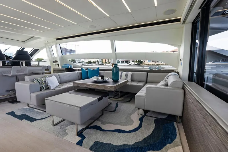 Slide: The Image of Luxurious interior of 2017 Pershing 82 VHP yacht with modern seating and stylish decor. - 49
