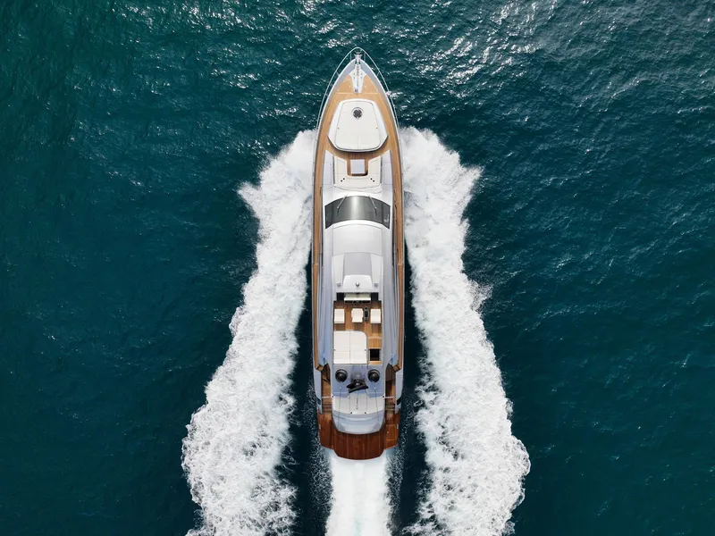 Slide: The Image of Aerial view of 2017 Pershing 82 VHP yacht cruising on the ocean. - 8