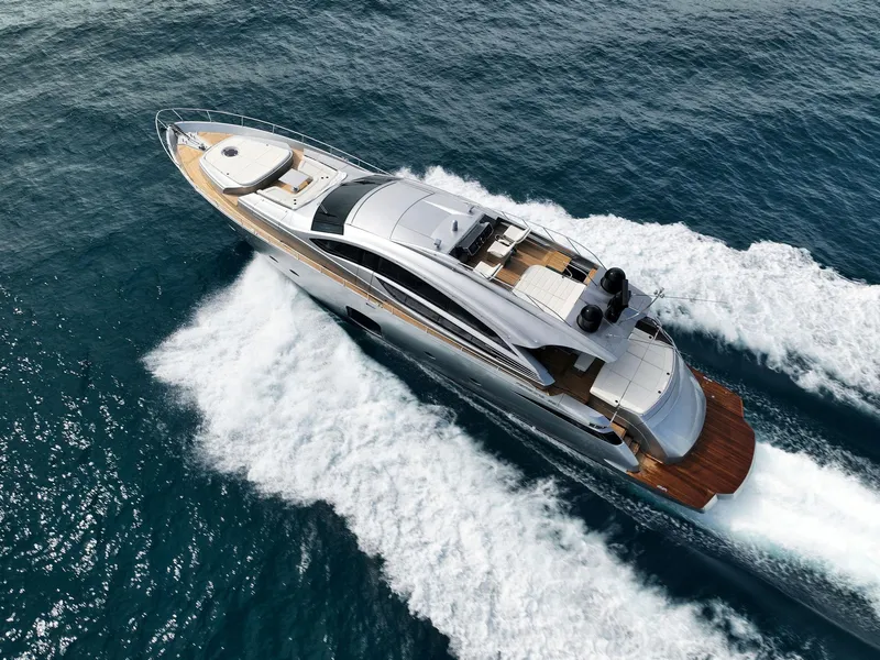 Slide: The Image of 2017 Pershing 82 VHP yacht cruising on open water. - 9