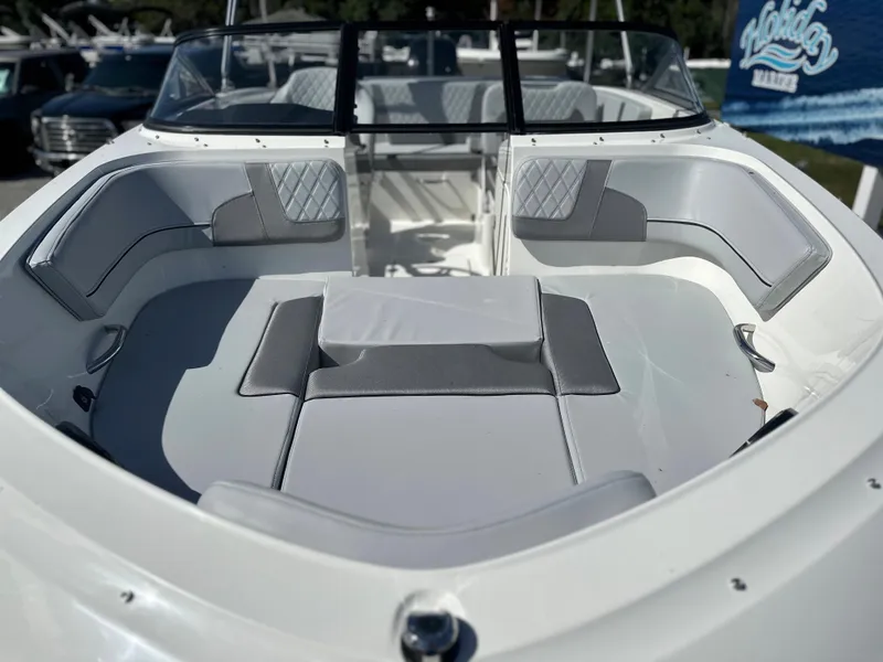 Slide: The Image of 2024 Bayliner VR5 Bowrider OB boat interior with cushioned seating. - 6