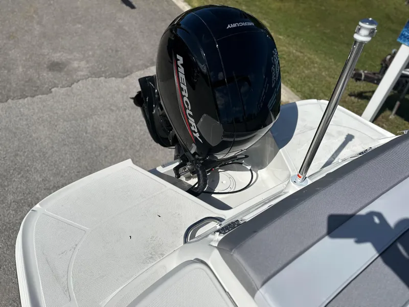 Slide: The Image of 2024 Bayliner VR5 Bowrider OB with Mercury outboard motor, rear deck view. - 7