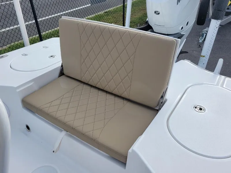 Slide: The Image of 2024 Blazer 2550 GTS boat with beige diamond-stitched seating. - 8