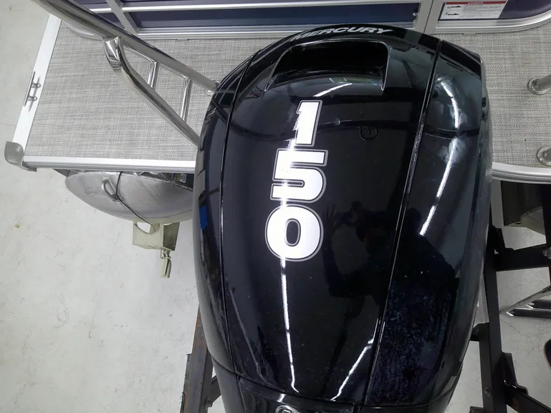 Slide: The Image of 2024 Berkshire 24CL LE 2.75 boat with a Mercury 150 outboard motor. - 11