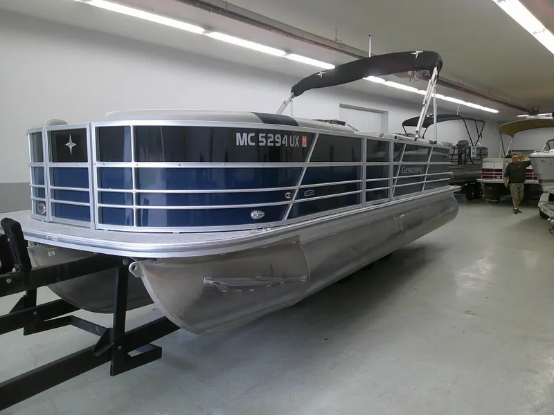 Slide: The Image of 2024 Berkshire 24CL LE 2.75 pontoon boat in showroom. - 3