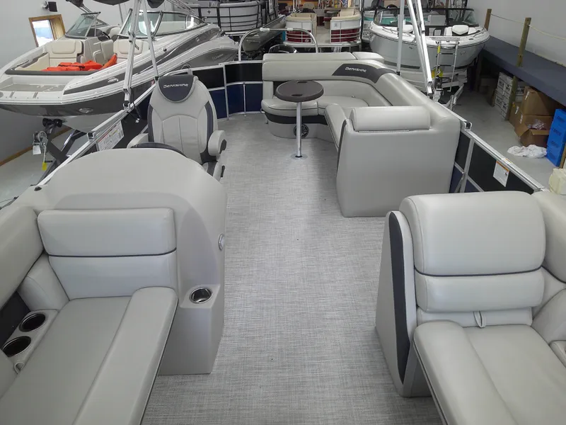 Slide: The Image of 2024 Berkshire 24CL LE 2.75 pontoon boat interior with plush seating and modern design. - 7
