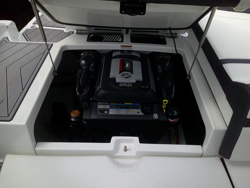 Slide: The Image of 2023 Monterey 218 SS Bowrider engine compartment with open hatch. - 9