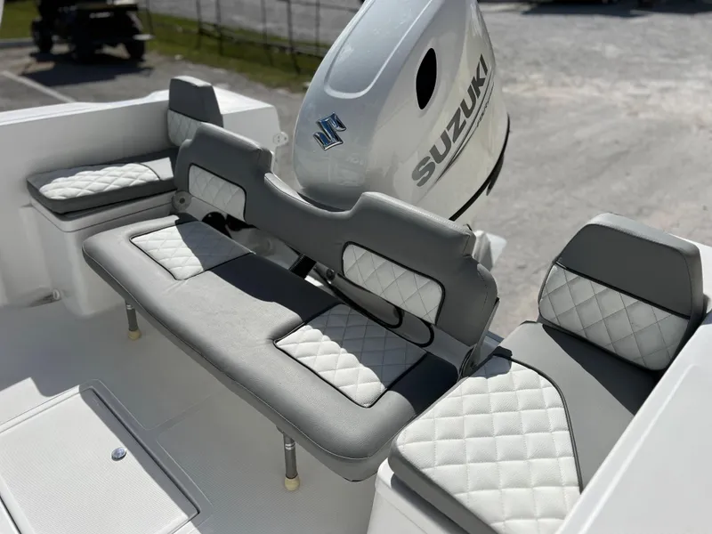 Slide: The Image of Clearwater 2000 boat 2024 model with Suzuki engine and cushioned seating. - 18
