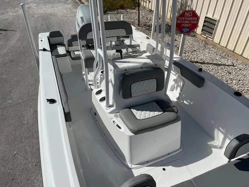 Slide: The Image of 2024 Clearwater 2000 boat interior with seating and console. - 29