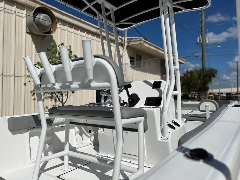 Slide: The Image of 2024 Clearwater 2000 boat interior with seating and rod holders. - 7