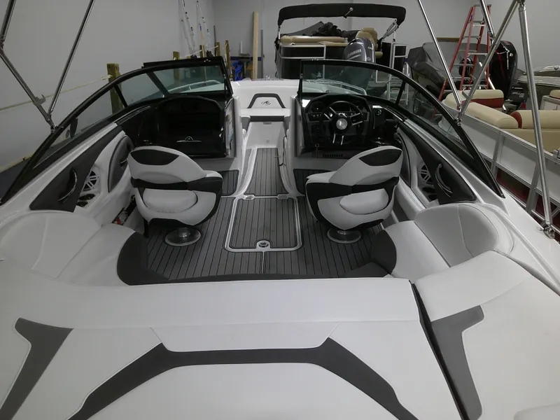 Slide: The Image of 2023 Monterey 224 FS Bowrider interior, sleek design, comfortable seating, modern dashboard. - 10