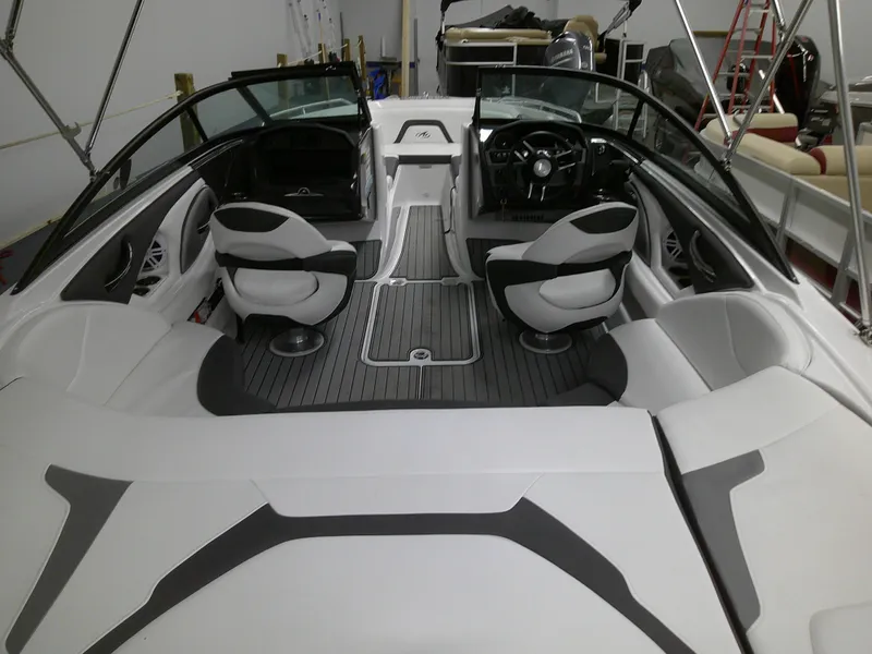 Slide: The Image of 2023 Monterey 224 FS Bowrider interior with modern seating and sleek design. - 11