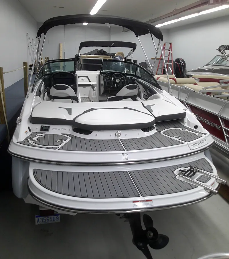 Slide: The Image of 2023 Monterey 224 FS Bowrider boat in showroom. - 12