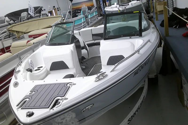 Slide: The Image of 2023 Monterey 224 FS Bowrider boat on display in showroom. - 7