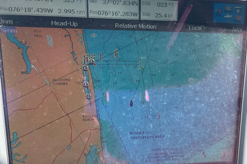 Slide: The Image of Navigation display on a 2004 Pursuit 2670 Cuddy Console boat. - 15