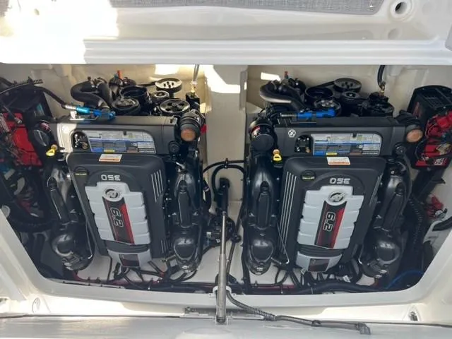 Slide: The Image of Twin engines of a 2024 Formula 310 CBR boat. - 10