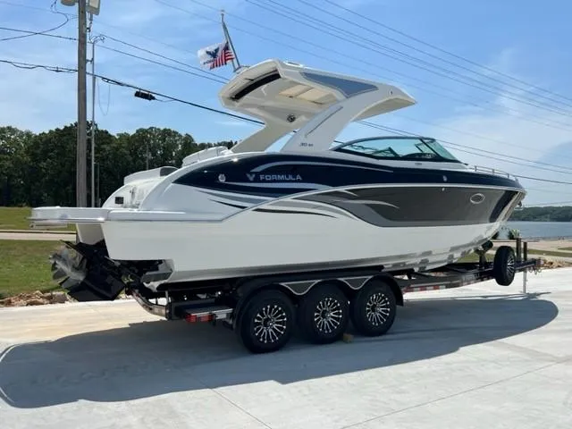 Slide: The Image of 2024 Formula 310 CBR boat on a trailer, side view. - 3