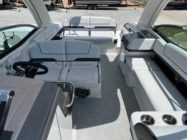 Slide: The Image of 2024 Formula 310 CBR boat interior with luxurious white seating and modern design. - 7