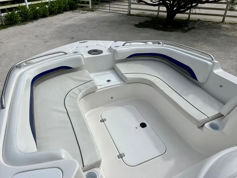 Slide: The Image of 2011 Hurricane 231 boat with spacious seating and storage compartments. - 9