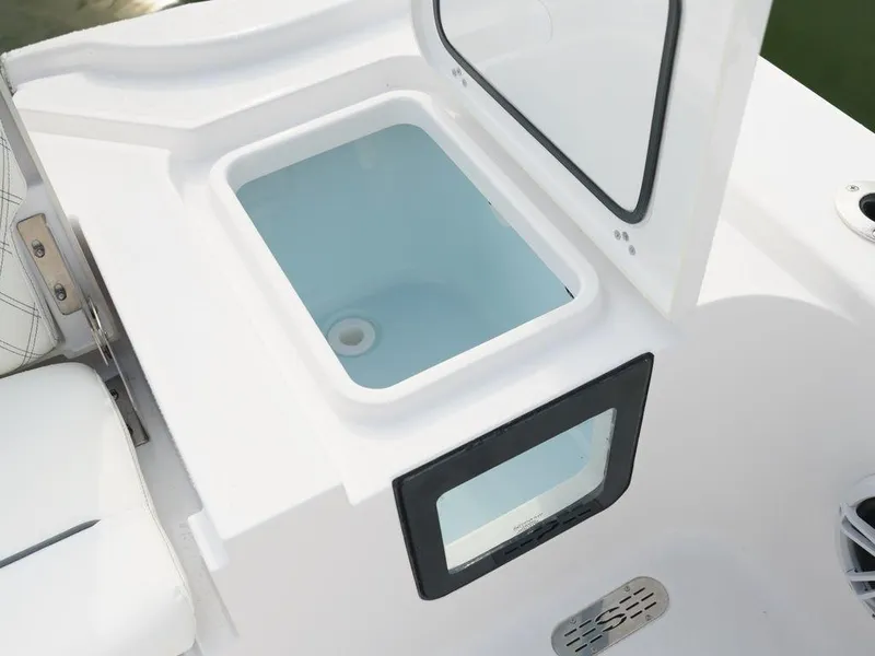 Slide: The Image of 2024 Sportsman Masters 267OE Bay boat livewell with open lid. - 11