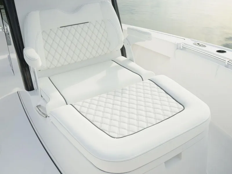Slide: The Image of Luxurious white seating on 2024 Sportsman Masters 267OE Bay boat. - 12