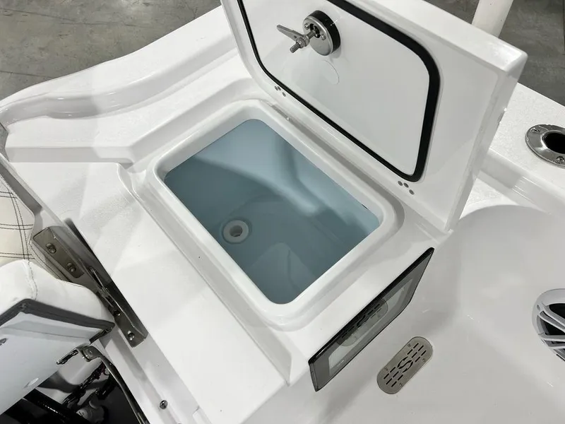 Slide: The Image of 2024 Sportsman Masters 267OE Bay boat storage compartment with open lid. - 37