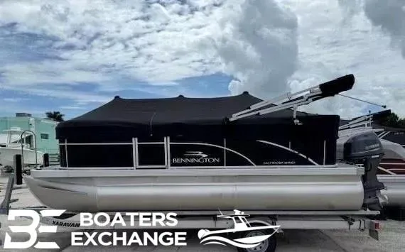 Slide: The Image of 2024 Bennington 188SVL pontoon boat with black canopy at Boaters Exchange. - 1