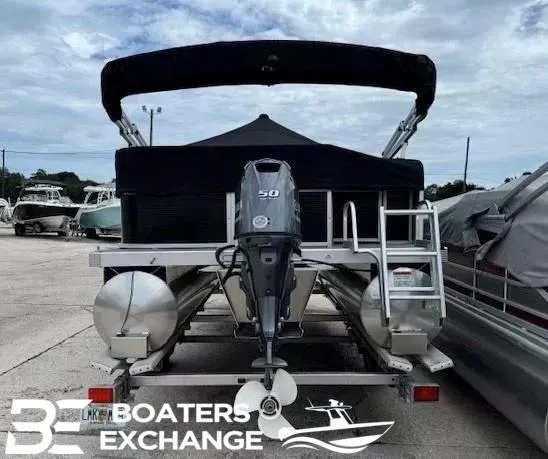 Slide: The Image of 2024 Bennington 188SVL pontoon boat with outboard motor at Boaters Exchange. - 2